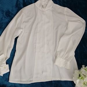 white blouse with pleated front detail